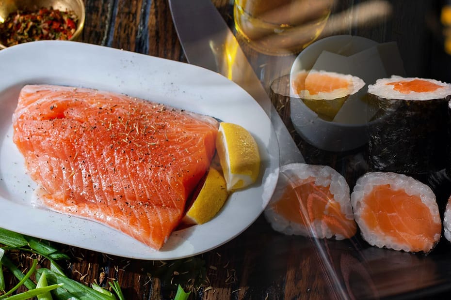 Raw salmon and salmon sushi, seafood meal